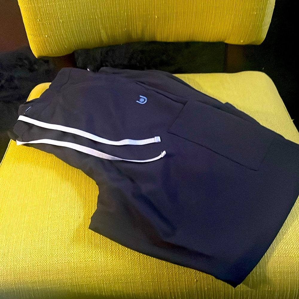 Woman’s black scrub bottoms